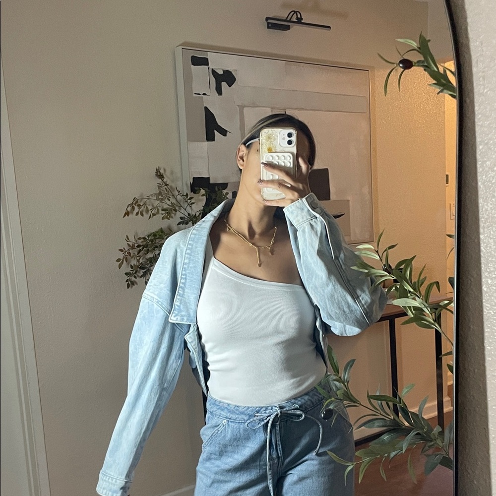 Light Blue Denim Jacket with White Tank Top